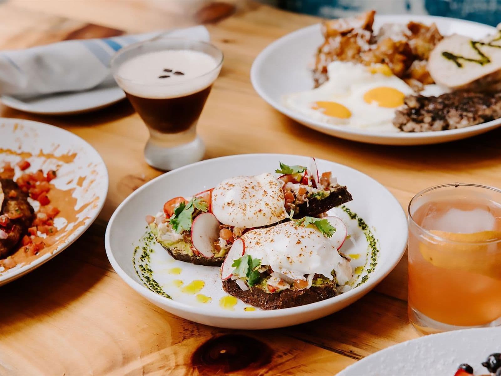 Brunch spread with cocktails and shareable plates at Crown Republic Gastropub