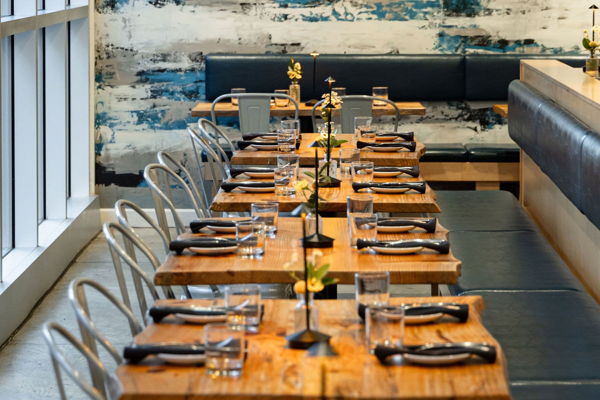 Long private dining table set for an event before guests arrive at Crown Republic Gastropub, Cincinnati